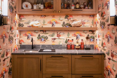 Example of a southwest home bar design in Minneapolis