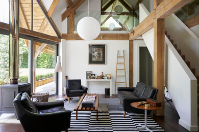 Example of a farmhouse living room design in London