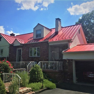 Installing Brilliance Red Standing Seam Metal Roof on Main Home in Langhorne, PA