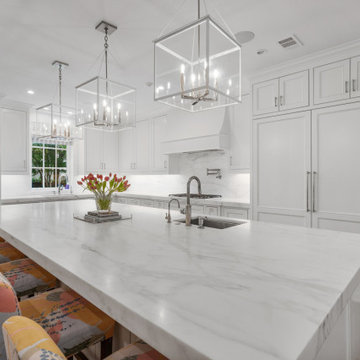 Elegant Modern French Country Kitchen with Marble Accents and Floral Charm