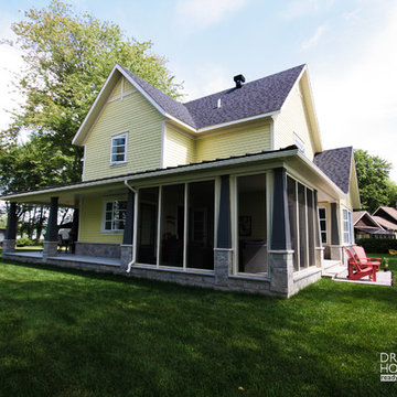Lakefront Country Cottage FarmHouse #3926 By Drummond House Plans