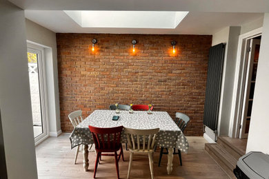 Design ideas for a medium sized traditional dining room in Sussex.