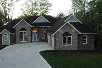 Eclectic gray two-story mixed siding exterior home photo in Other