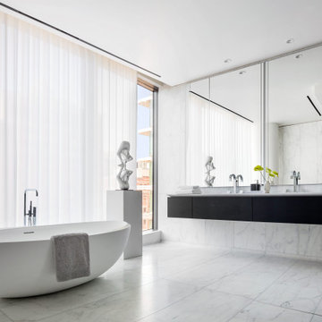 A bathroom with the EzyPelmet installed. This recessed pelmet opens up the space