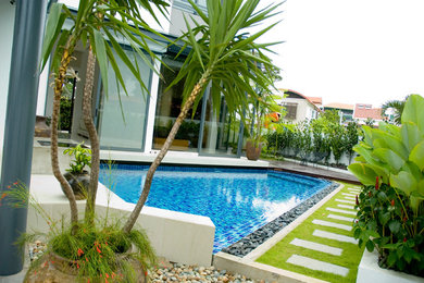 Design ideas for a mid-sized modern pool in Singapore.