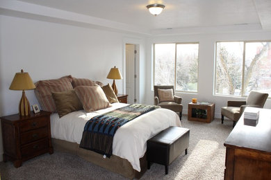Example of a transitional bedroom design in Salt Lake City