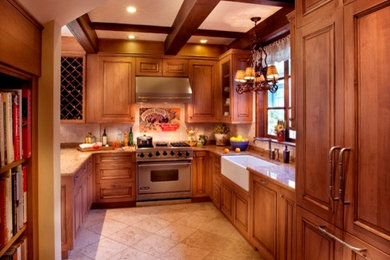 Example of a small classic galley ceramic tile eat-in kitchen design in San Francisco with a farmhouse sink, beaded inset cabinets, medium tone wood cabinets, granite countertops, beige backsplash, stone slab backsplash, paneled appliances and no island