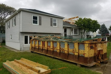 Example of a beach style home design design in Philadelphia