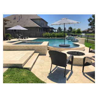 Travertine Pools with Raised Beam Walls - Houston - by Great Escapes ...
