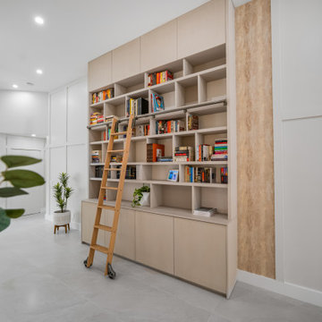 Full View of Custom Bookshelf with Rolling Ladder