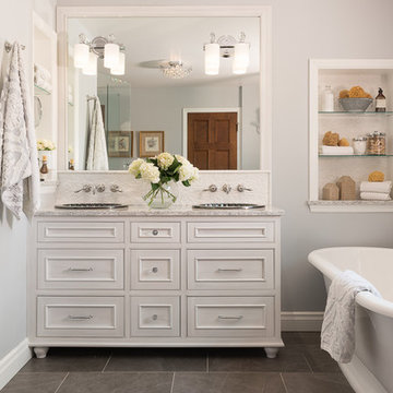 White Bathroom with Double Vanity and Free Standing Bathtub