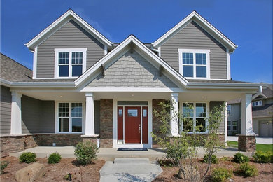 Example of an arts and crafts exterior home design in Milwaukee