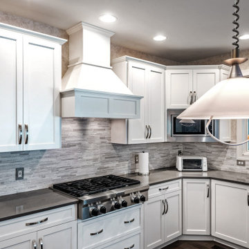 Contrasting White and Dark Gray Cabinets and Countertops in Crownsville, MD