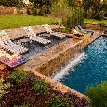 Modern Geometric Pool with Fire Features and Sun Shelf