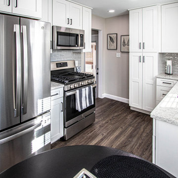 White and Gray Compact Kitchen with LVT Flooring
