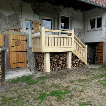 Habillage en mélèze d'un escalier extérieur en béton
