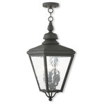 Livex Lighting Lights - Cambridge Outdoor Chain-Hang Lantern, Black - This stylish black outdoor chain hang lantern is a great way to update your home's exterior decor. A flat metal curved arm attaches the solid brass decorative housing to the square backplate while clear water glass protects the three bulbs.
