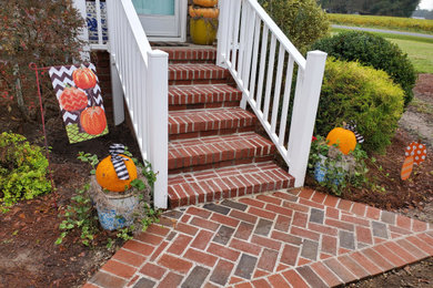 Example of a small country entryway design in Other