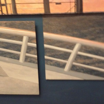 Mural of nautical scene - cargo ship on ocean and oil rig