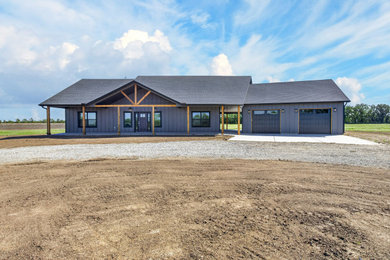 Example of a country exterior home design in Wichita