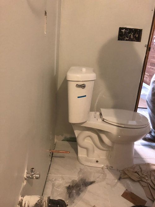 Gap between toilet and wall