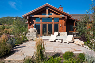 Example of an arts and crafts exterior home design in Denver