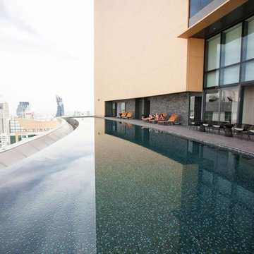 Modern pool with custom recycled glass mosaic mix