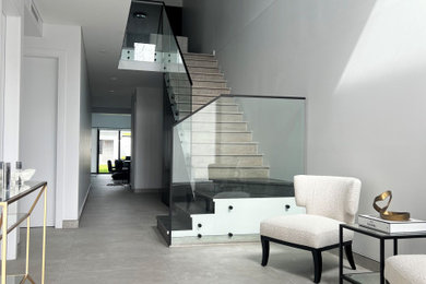 Modern entryway in Sydney with white walls.