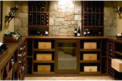 This is an example of a modern wine cellar in Other.