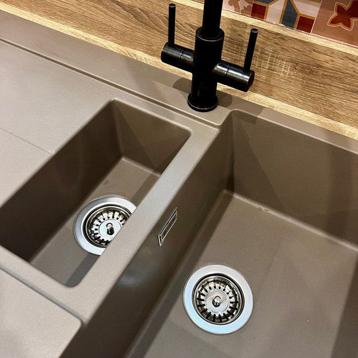 Enclosed kitchen - mid-sized contemporary galley vinyl floor and brown floor enclosed kitchen idea in Other with flat-panel cabinets, distressed cabinets, laminate countertops, multicolored backsplash