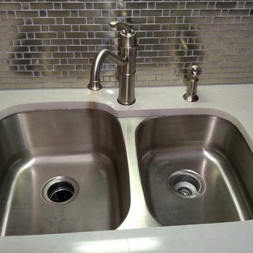 London Grey Caesarstone with Stainless Steel Backsplash
