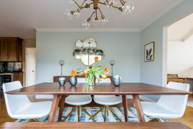 Mid-sized 1950s light wood floor and brown floor kitchen/dining room combo photo in San Francisco with blue walls