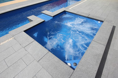 Small contemporary courtyard pool in Perth.