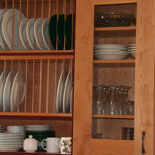 Farmhouse kitchen pantry designs - Kitchen pantry - cottage limestone floor kitchen pantry idea in Albuquerque with a double-bowl sink, shaker cabinets, light wood cabinets, quartz countertops, beige backsplash, stone tile backsplash, black appliances and an island