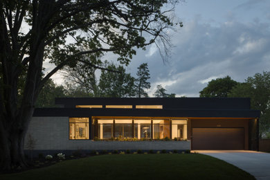 Example of a 1950s exterior home design in Kansas City