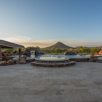 Natural Stone Freeform Pool + Perimeter Overflow Spa