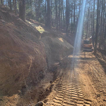 Retaining wall and rip rap rock installation