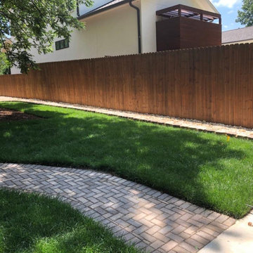 Screen porch, basketball court, and landscaping