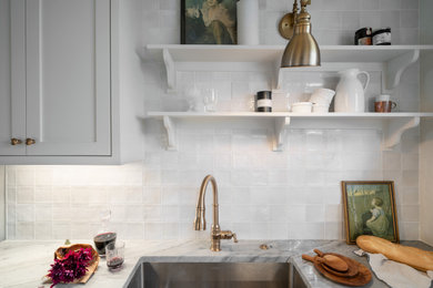 Example of a small classic galley ceramic tile and gray floor eat-in kitchen design in Portland with an undermount sink, shaker cabinets, white cabinets, quartzite countertops, white backsplash, ceramic backsplash, stainless steel appliances, no island and multicolored countertops