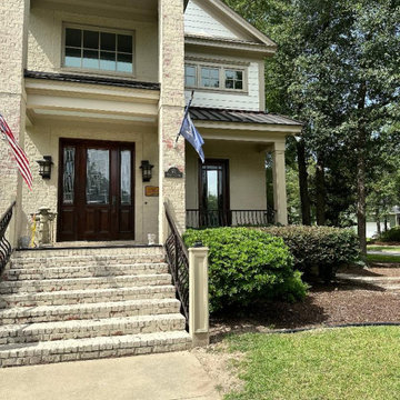 MCCOY- EXTERIOR : TILED PORCHES & FRONT DOOR ENTRANCE - AFTER PICTURES