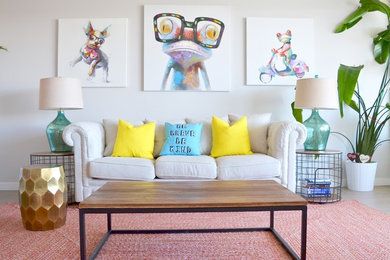 Inspiration for an eclectic open concept living room remodel in Vancouver with white walls