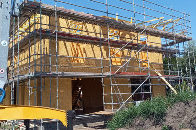 Idées déco pour une façade de maison contemporaine.