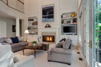 Large elegant loft-style gray floor living room photo in Denver with a standard fireplace