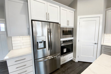 Example of a minimalist kitchen design in Other