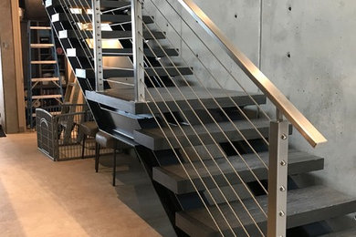 Staircase - industrial staircase idea in Orange County