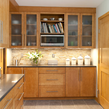Storage and display are added to this contemporary kitchen