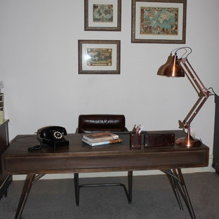 Photo of a mid-sized industrial study room in Melbourne with white walls, ceramic floors and a freestanding desk.