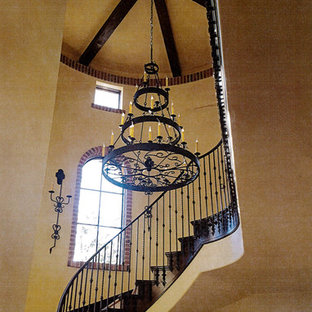 На фото: класса люкс огромные фойе в средиземноморском стиле с бежевыми стенами, полом из терраццо, двустворчатой входной дверью, входной дверью из темного дерева и бежевым полом