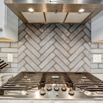 Open Floorplan and Bar Seating For A Restaurant Owner's Personal Kitchen