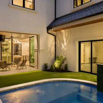 Modern Courtyard Pool with Indoor-Outdoor Living